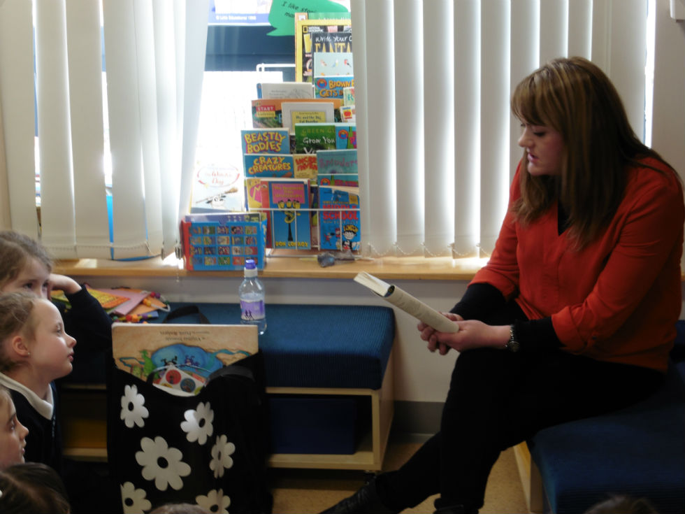 Mrs Yvonne Duggan reads to Primary 1-4